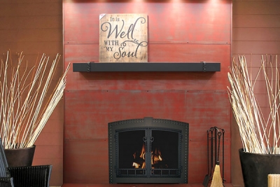 Products pictured:  Fireplace door, mantel, steel wall panels, coordinating fireplace tools
